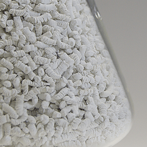 Granules of magnesium hydroxide based heat storage material, CHARGEMAG® produced by Tateho Chemical